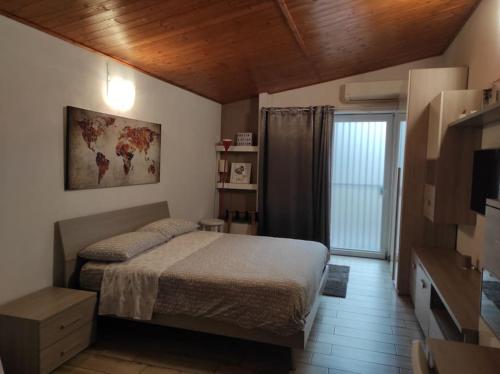 En eller flere senge i et værelse på Amazing Appia Antica