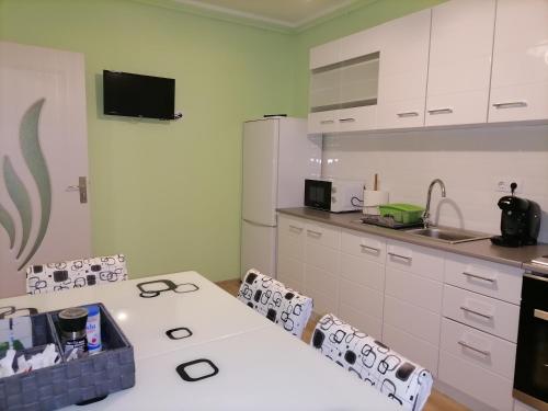 A cozinha ou kitchenette de Apartament NyX