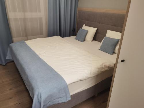 Ένα ή περισσότερα κρεβάτια σε δωμάτιο στο Meduza w Bel Mare