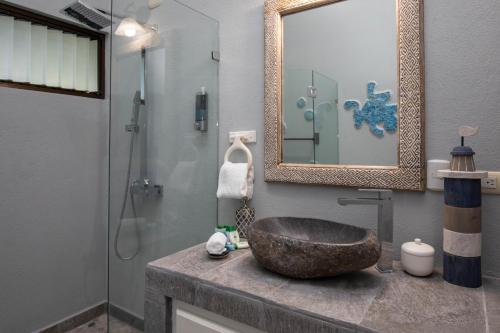 Ванная комната в Casa de Paz- Portasol Vacation Rentals