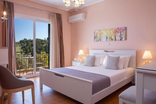 Ένα ή περισσότερα κρεβάτια σε δωμάτιο στο Villa Daphne, Inoro Villas