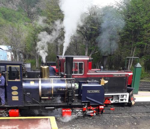 a steam engine train is on the tracks at Casona Los Arri in Ushuaia