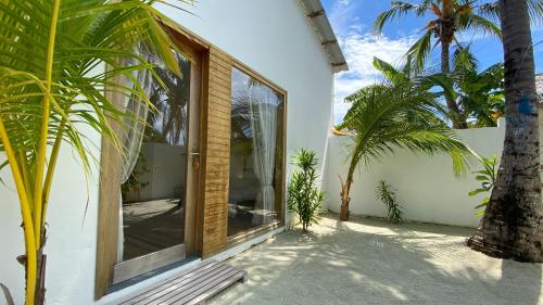 Giardino di Villa Kudì Maldives Guest House Thulusdhoo