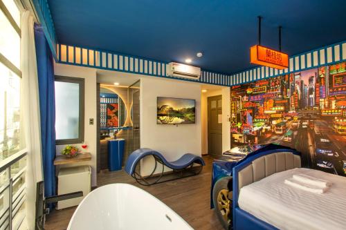 a childrens bedroom with a city mural on the wall at EROS HOTEL 2 - Love Hotel in Ho Chi Minh City