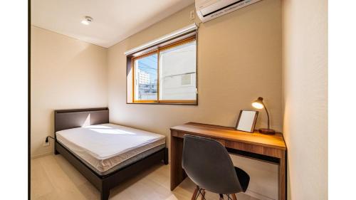 Letto o letti in una camera di THE GATE HOSTEL SHONAN FUJISAWA