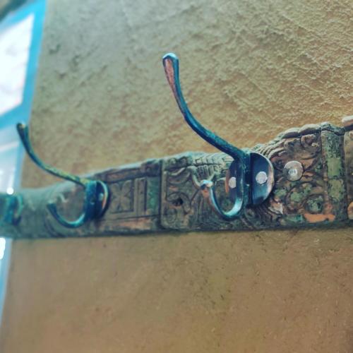 a close up of a strap on a wall at ShivaRewa Village stay in Maheshwar