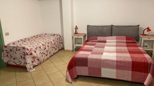 Krevet ili kreveti u jedinici u objektu AL VECCHIO PERO, con ampio giardino privato