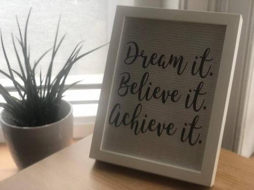 a sign that says dream it believe it achieve it at Marcela's Place - Private Studio near Heathrow in West Drayton
