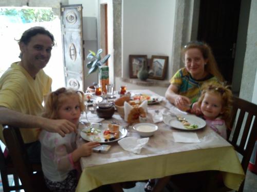 a group of people sitting at a table eating food at Demirkapi Konak Hotel in Safranbolu