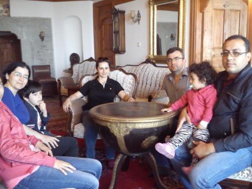 a group of people sitting around a table at Demirkapi Konak Hotel in Safranbolu