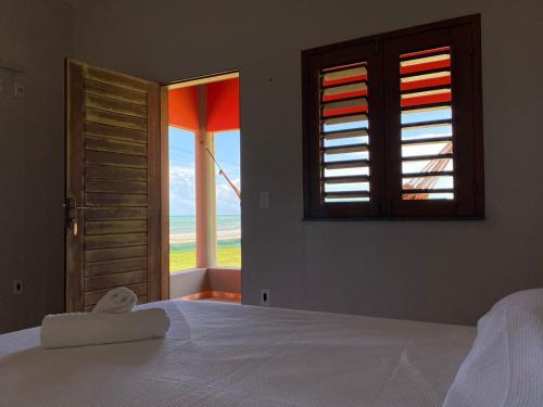 Takito Kite House, Praia da Baleia, Itapipoca CEにあるベッド