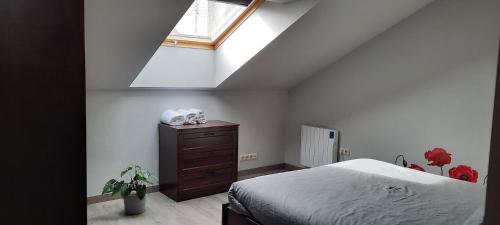 En eller flere senge i et værelse på Duplex en Casas da Bríxida - Cangas do Morrazo