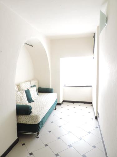 En eller flere senge i et værelse på Antico Borgo