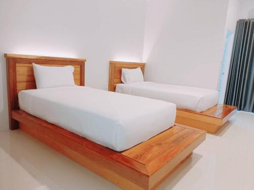Greenish Ranong Hotelにあるベッド