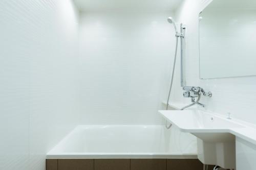 Ванная комната в HOTEL KARAE