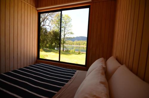 Postel nebo postele na pokoji v ubytování Nativo Lodges