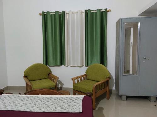 Χώρος καθιστικού στο Tharavad Holiday Home