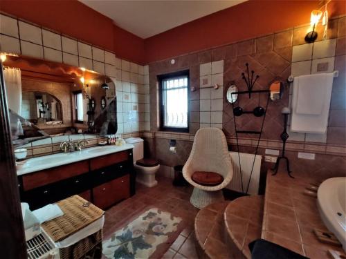 Kupatilo u objektu Villa Tethys Mountain Resort