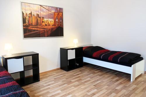 Postel nebo postele na pokoji v ubytování 3 Zimmerwohnung mit Garten