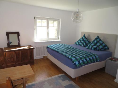 Кровать или кровати в номере Ferienwohnung Christine am Weissenbach