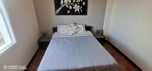 En eller flere senge i et værelse på Quarto vista mar