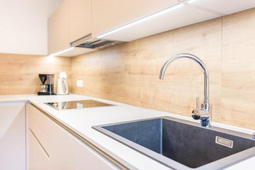 Kuchyňa alebo kuchynka v ubytovaní Appartement Rosa Seis