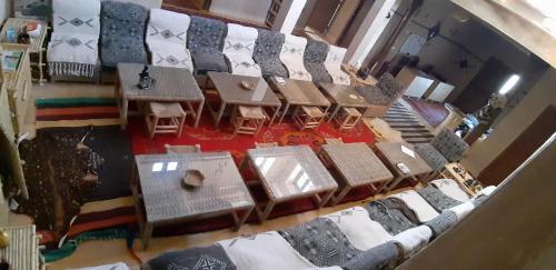 an overhead view of a room with tables and chairs at Kasbah Izoran in Midelt
