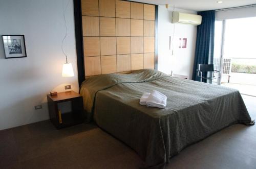 Кровать или кровати в номере Rayong Seaview Condo 230 sqm condo, 2 bedroom