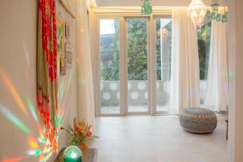 a room with a large door and a window at Villa Ellena By The Villas 100 in Paragajen