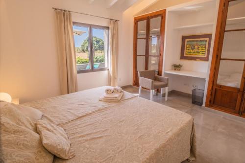 Postel nebo postele na pokoji v ubytování Finca CAN LLORENC by Mallorca Villa Selection