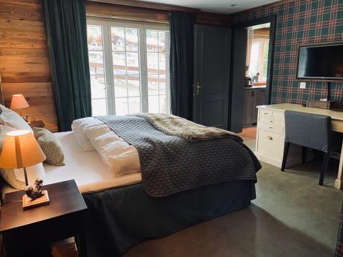 Postel nebo postele na pokoji v ubytování Chalet Bull Zermatt