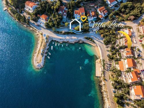 an aerial view of a resort near the water at Villa Leda in Korčula