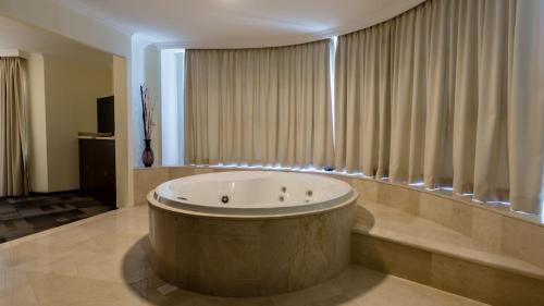Kylpyhuone majoituspaikassa Hotel Costa Pacifico - Suite