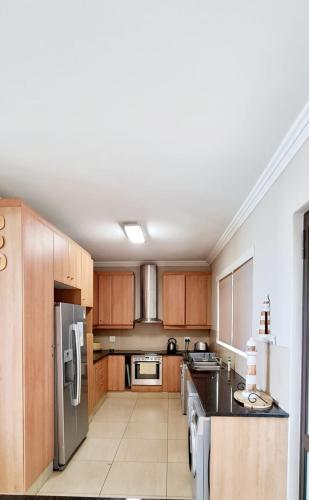 Una cocina o zona de cocina en Privacy at its best - 23b Sovereign Sands