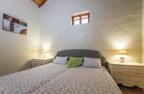 Ένα ή περισσότερα κρεβάτια σε δωμάτιο στο Tenerife Paradise 01 Chalet - Hotel Rural Fsj