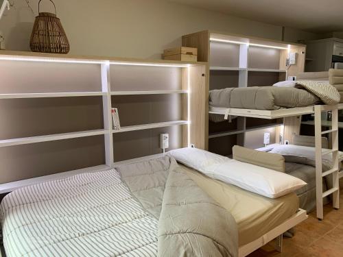 Katil atau katil-katil dalam bilik di Apartament reformat i acollidor a Vielha, ben ubicat