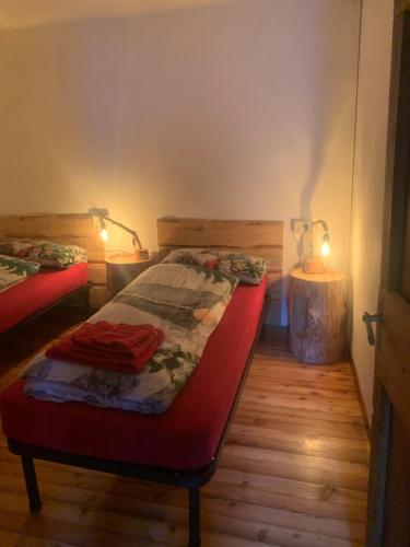 Postel nebo postele na pokoji v ubytování Ul baitin da In Re