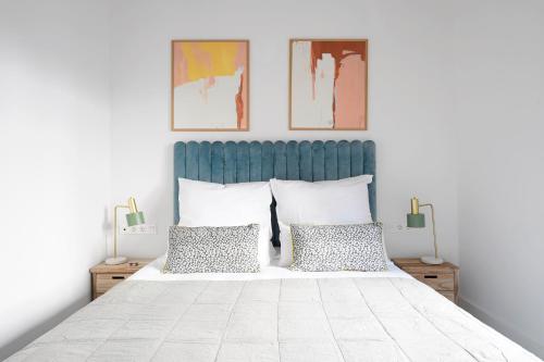 Ένα ή περισσότερα κρεβάτια σε δωμάτιο στο numa I Solea Apartments
