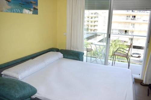 Ein Bett oder Betten in einem Zimmer der Unterkunft Romántico Daimús 2