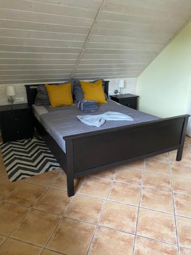 Una cama o camas en una habitación de Villa Kokosowa