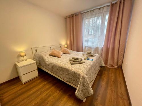Posteľ alebo postele v izbe v ubytovaní Apartament Weronika