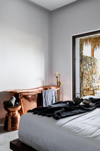 Ένα ή περισσότερα κρεβάτια σε δωμάτιο στο Charisma Hotel and Wellness Club