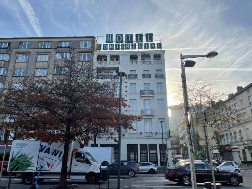 a truck parked in front of a building at Hotel Continental Gare du Midi in Brussels
