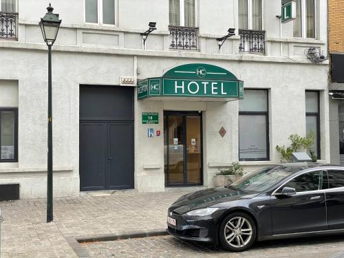 a car parked in front of a hotel at Hotel Continental Gare du Midi in Brussels