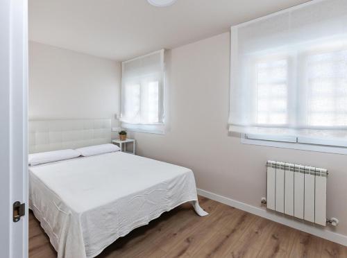 Posteľ alebo postele v izbe v ubytovaní A Tu Lado VUT 09306