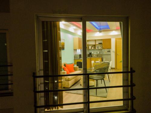 a view of a living room and kitchen from a balcony at Estancia Casa Real Frente a la Zona Colonial in Calero