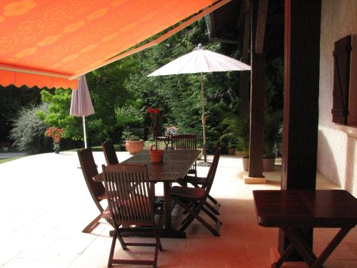 Patio nebo venkovní prostory v ubytování Le Pas de L'Ane Chambres d'hôtes
