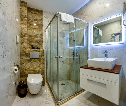Koupelna v ubytování ALBA HOTEL & SPA