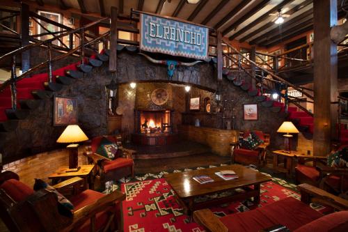an overhead view of a restaurant with a fireplace at Hotel El Rancho in Gallup