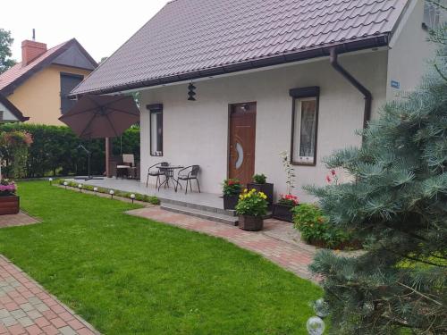 Holiday house with swimming pool in Morzyczyn